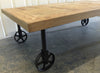Industrial Chic Wood Coffee Table With Industrial Wheels