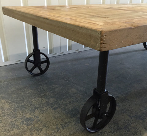 Industrial Chic Wood Coffee Table With Industrial Wheels