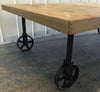 Industrial Chic Wood Coffee Table With Industrial Wheels