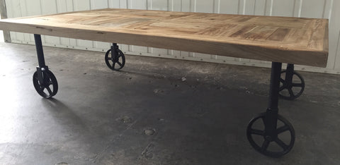 Industrial Chic Wood Coffee Table With Industrial Wheels