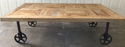 Industrial Chic Wood Coffee Table With Industrial Wheels